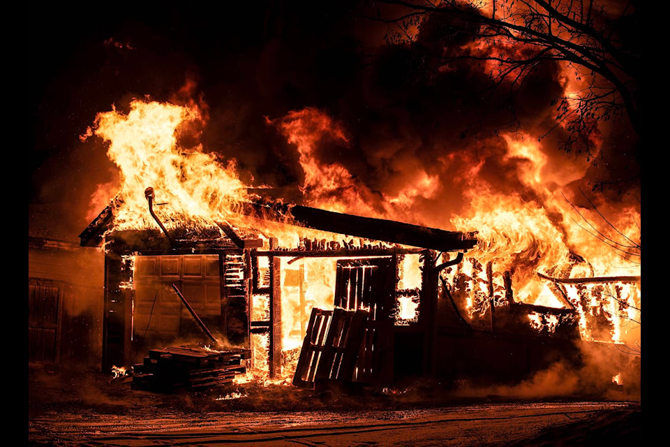 A fire destroyed a garage in the 300 block 5th Street. Photo: Glen Freeman