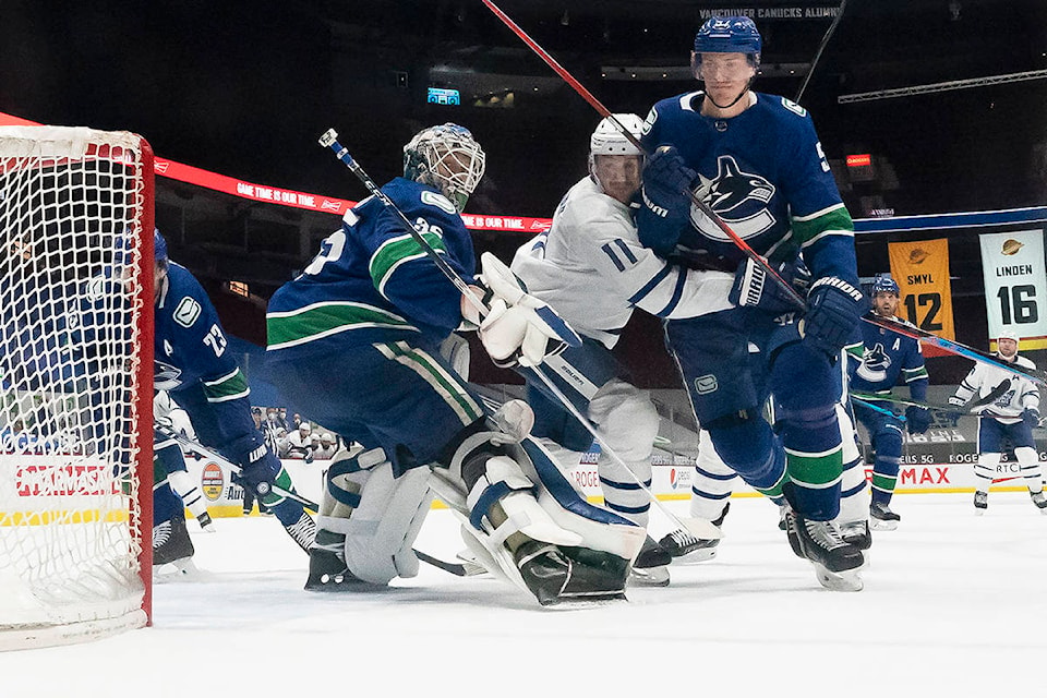 24427297_web1_210304-IFD-Canucks-Leafs-Canucks_1