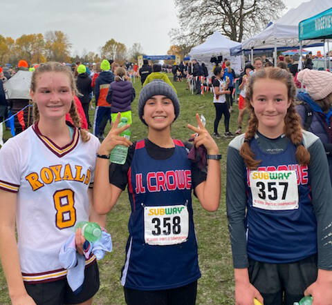 Seven Summits Ella Svenson (left) competed with J.L. Crowe athletes Sety Roshdi Benam and Jill OHearn at the provincial cross country championship at Jericho Beach in Vancouver Nov. 6. Photo: submitted