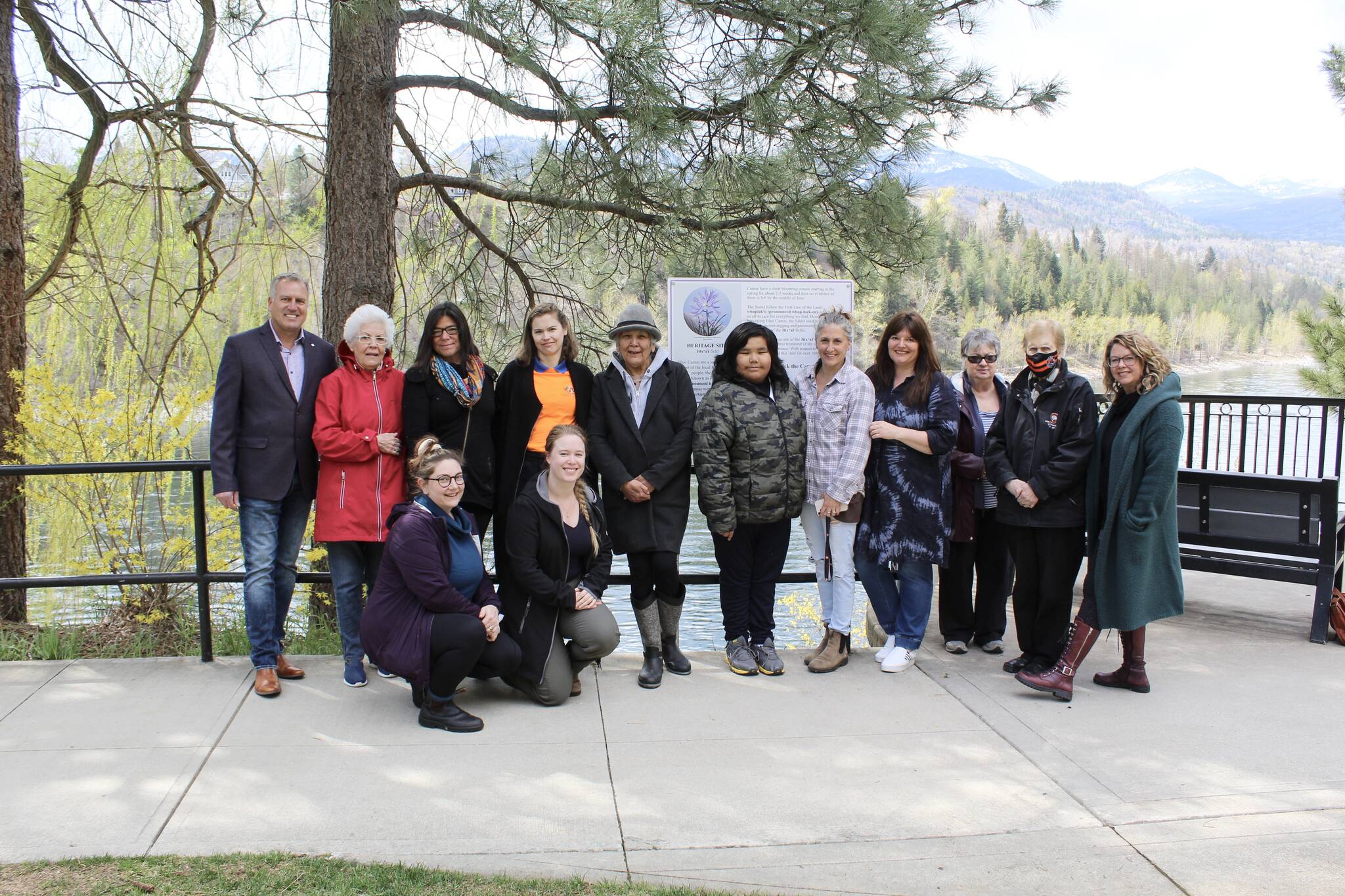 L-R: Chris McIsaac, City of Trail; Coun. Carol Dobie; Kimberly Robertson; Elinor Morrisey, Trail museum archives; Rachel Brown, Trail Community in Bloom; Addison Oberg, Trail museum archives; Sinixt Matriarch Marilyn James; Zeke Day, Glenmerry Elementary School; Kirsten Den Biesen, Indigenous Support Worker Glenmerry Elementary School; Andrea Jolly, City of Trail; Lana Rodlie, Trail Community in Bloom; Coun. Eleanor Gattafoni Robinson; Sam Murphy; Trail District Public Library.