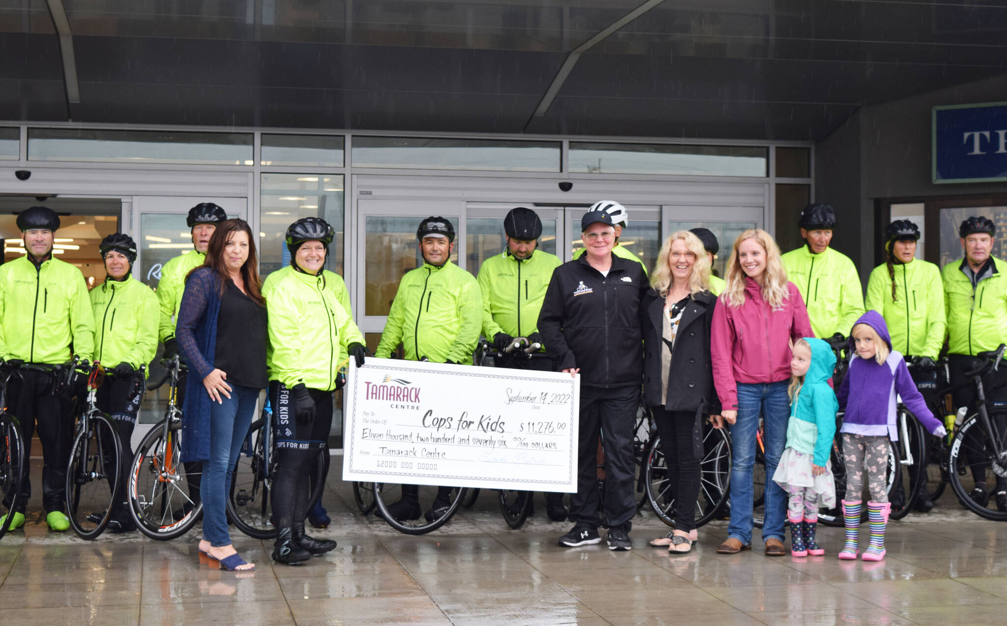 The Cops for Kids ride stopped in Cranbrook on Wednesday, Sept. 14 where they were greeted with a cheque from the Tamarack Centre for $11,276. The funds were raised through the malls Party in the Parking Lot party in August. (Corey Bullock/Cranbrook Townsman)