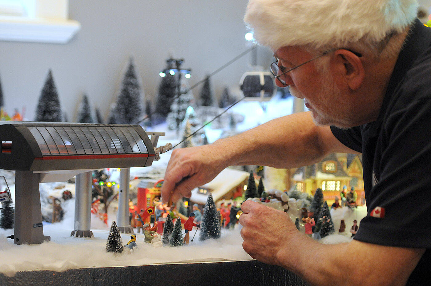 Terry Campbells display of Christmas miniatures takes up the entire dining room of his Chilliwack home. He started the display in 2007 but it has been more challenging for him lately as hes been legally blind since 2018. (Jenna Hauck/ Chilliwack Progress)