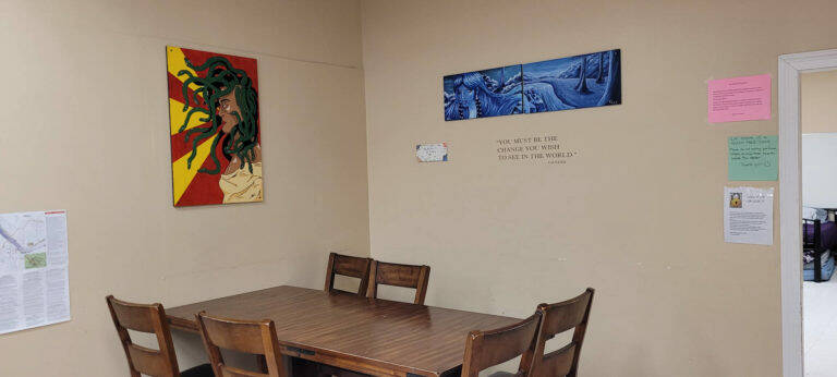 Art from J.L. Crowe high school students brightens the walls of the downtown Trail shelter.