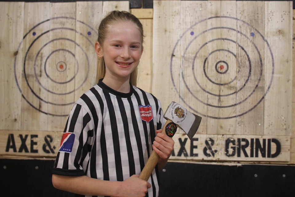 Victoria’s Maddy Mathe, who turned 10 on Feb. 14, is the youngest member in her league axe-throwing and recently certified as an official with the World Axe Throwing League. (Christine van Reeuwyk/News Staff)