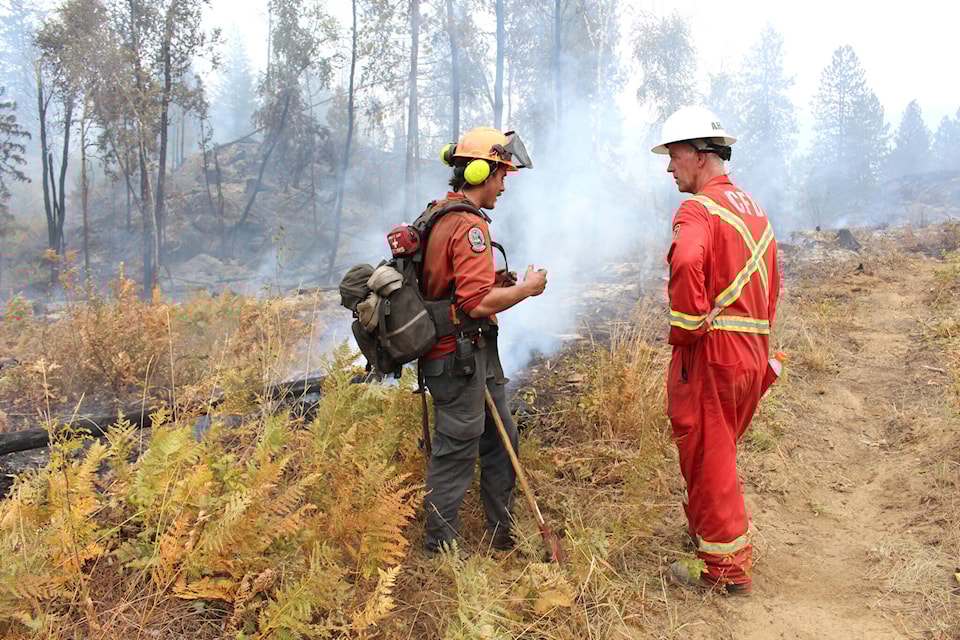 33547087_web1_230810-CAN-front-wildfire_1