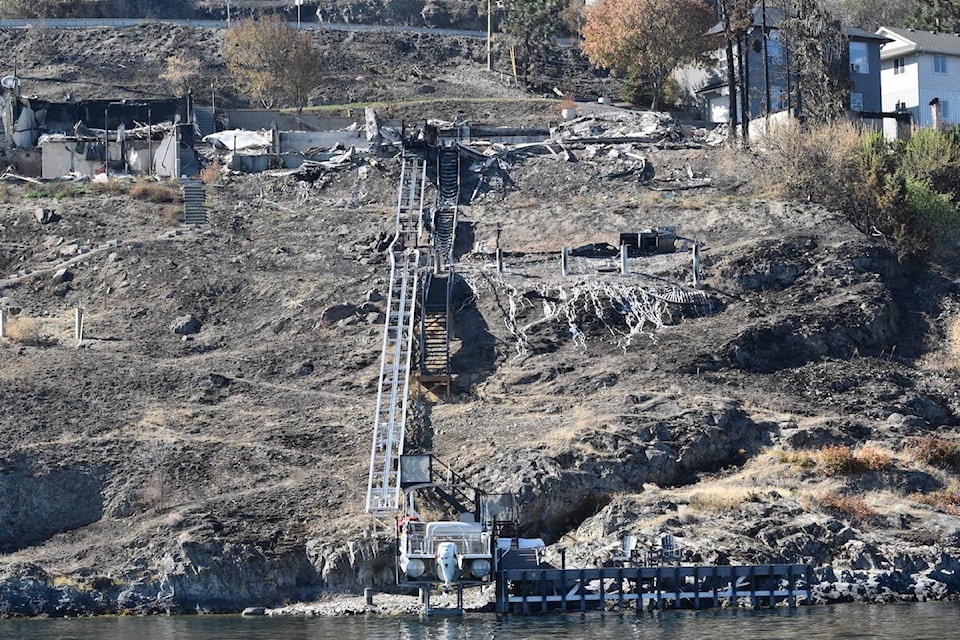 Extensive wildfire damage is visible from Okanagan Lake after the McDougall Creek wildfire swept through the Central Okanagan. (Brittany Webster/Capital News)