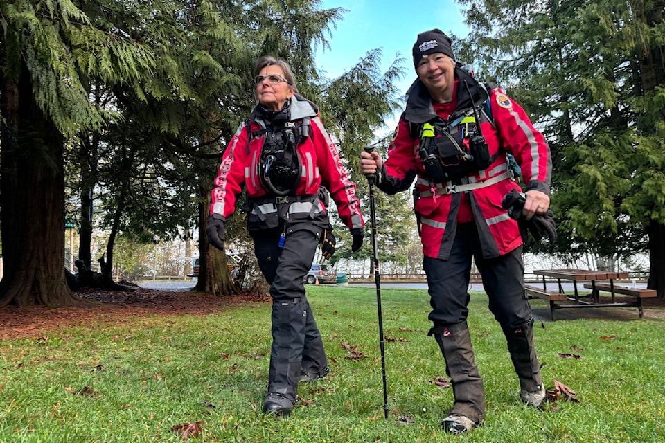 Metchosin Search and Rescue crew members marching towards a PKOLS trail, about to begin their search for Christian Dube on Nov. 27.