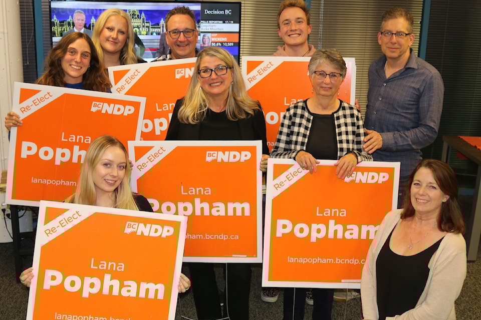 B.C. NDP's Lana Popham celebrates her re-election in Saanich South with her campaign team.