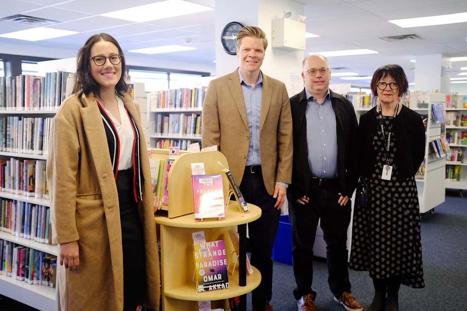 GVPL board chair Shahira Khair (left) and Saanich Mayor Dean Murdock toured the temporary Nellie McClung Express Branch on the morning of April 15.