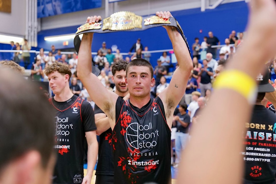 Payton Pritchard holds up his MVP belt after scoring 68 points in Victoria’s record-setting Ball Don’t Stop Pro-Am game.