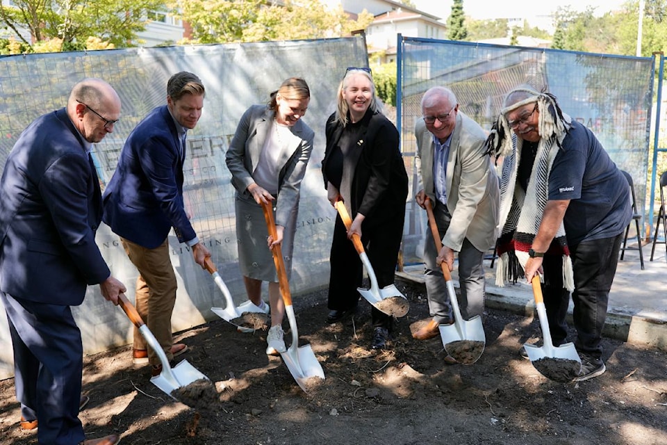 Kevin Harter (left), Mayor Dean Murdock, MLA Diana Gibson, MLA Nina Krieger, Peter Kruselnicki, and Tsawout Hereditary Chief Eric Pelkey break ground on Luther Court Society’s new 95-unit affordable housing development in Saanich.