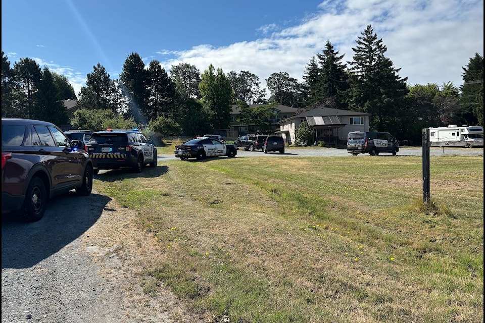A large police presence is seen in the 4400 block of Chatterton Way in Saanich July 10.