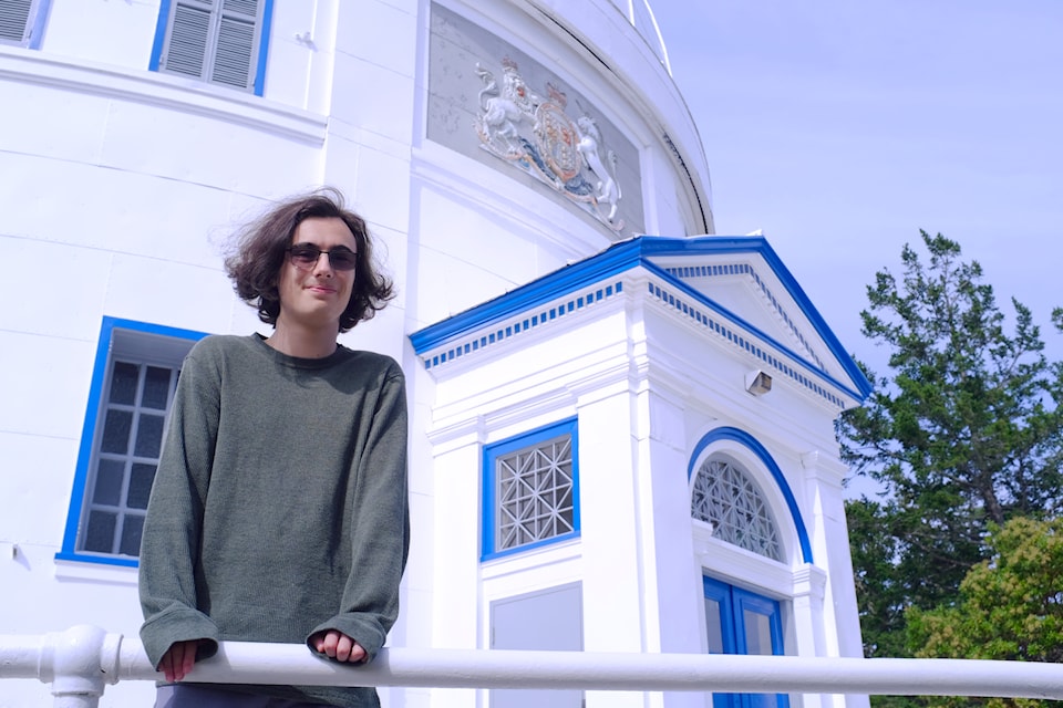 Nathan Hellner-Mestelman, 18, stands beside the Dominion Astrophysical Observatory, home to the 106-year-old Plaskett Telescope, which was the world’s largest when it opened.
