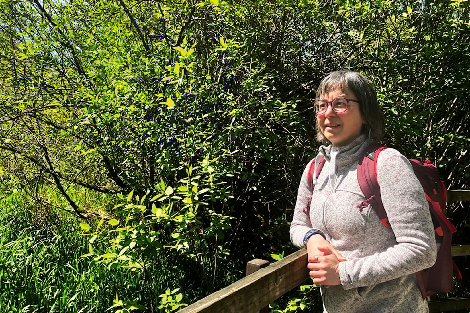 Agnes Kedmenecz guides visitors through a short walk designed to immerse people into nature. 
