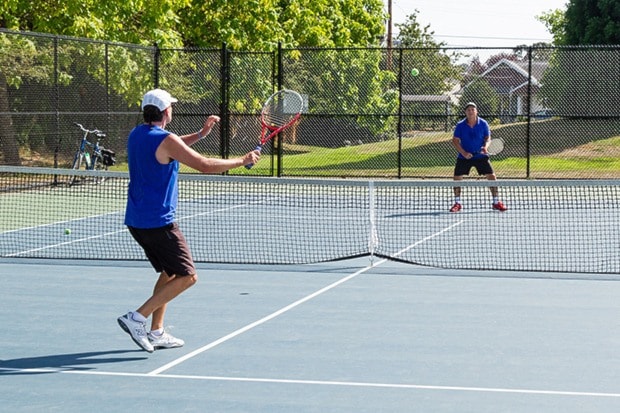 Rob McConnachie and Gilles Grenier trade backhands and forehands