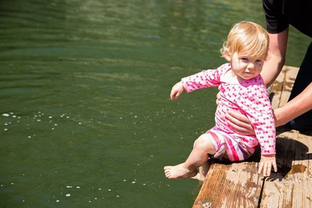 Elaura, 1, got her feet wet at the Gorge Waterway on Sunday, but