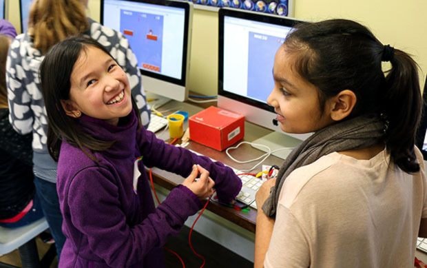 Sophie Chu and Esha Patel use electrical invention kits during S