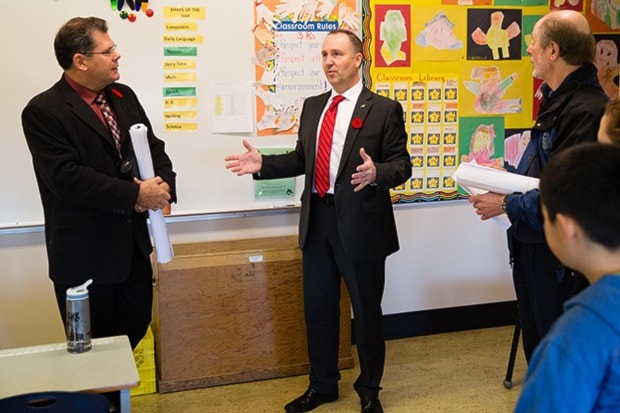 Jacob Zinn/News Staff - Education Minister Mike Bernier (centre)