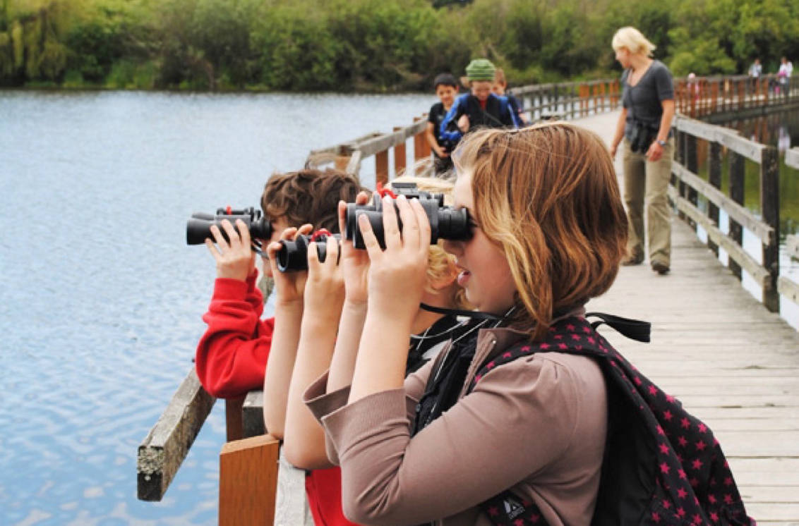 8181341_web1_170818-BPD-T-Student-using-binoculars-on-boardwalk