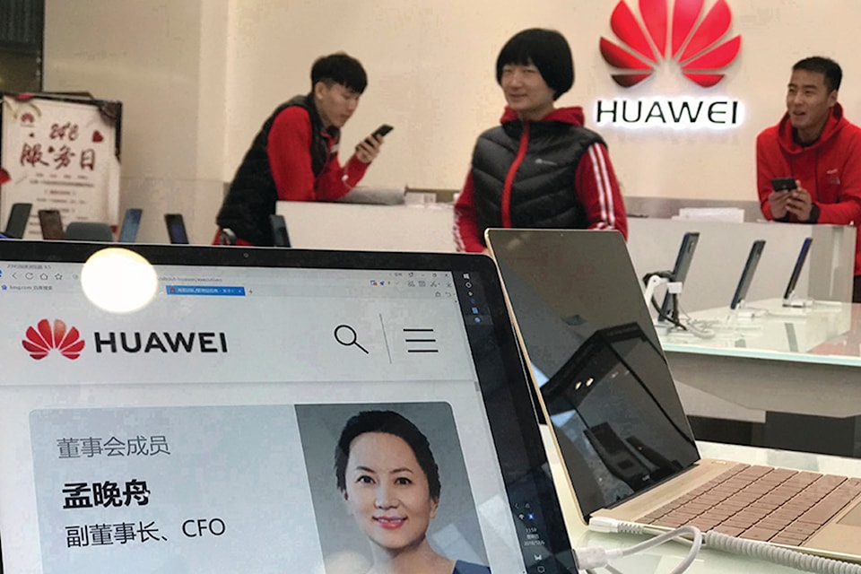 18216761_web1_181207-RDA-Huawei-arrest