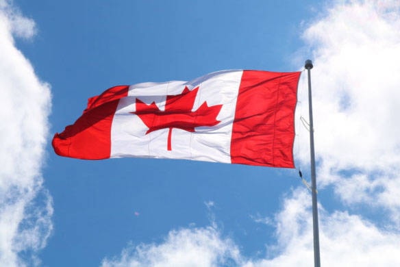 PHOTOS: Giant Canadian flag soars above new Langford RV dealership ...