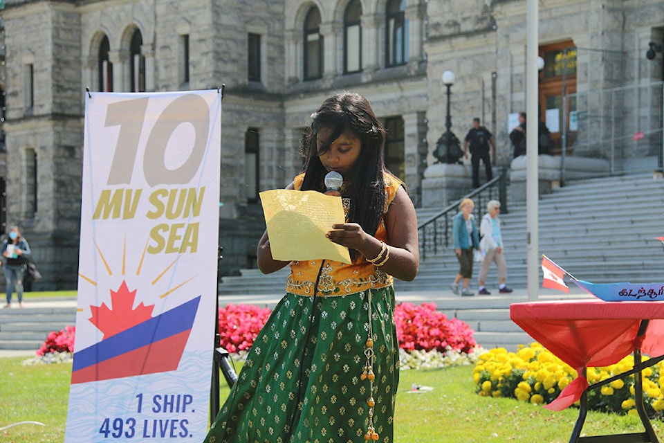Bynthavy Gunarobinson, daughter of Kunarobinson Christhurajah – an asylum seeker who was jailed for more than seven years after the MV Sun Sea landed in Canada – speaks to the crowd at an event to mark the anniversary of the ship’s arrival. (Kendra Crighton/News Staff)