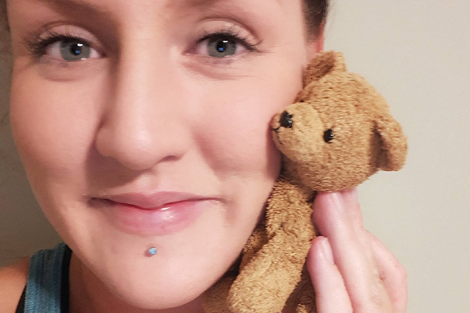 Tayla Beal of Parksville, reunited with a teddy bear she lost nearly 20 years ago. (Submitted photo)