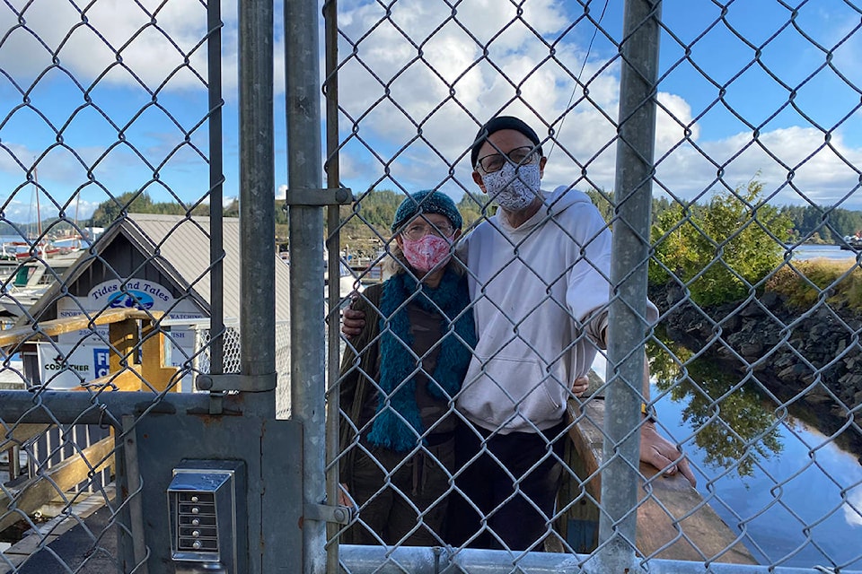 Sails down, masks up for Ron and Sherry Pryde, who completed a 119 day journey that was supposed to be 70 days. (Zoe Ducklow)