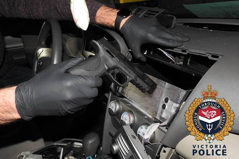 Police located a loaded .45 calibre handgun in a hidden compartment of a vehicle earlier this month. (VicPD)