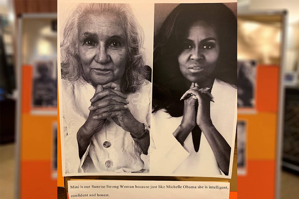 Sunrise of Victoria retirement community resident Mini Alexander poses next to Michelle Obama. Residents were asked to compare themselves to a powerful woman of history for Women’s History Month. (Courtesy of Sunrise of Victoria)