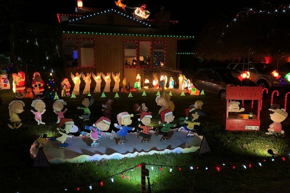 With over 100 pieces of hand-painted yard art – in particular the Peanuts gang – 4360 Torquay Dr. was a shoo-in for first place, Light Up the City judges said. (Courtesy of Yvette Fornelli)