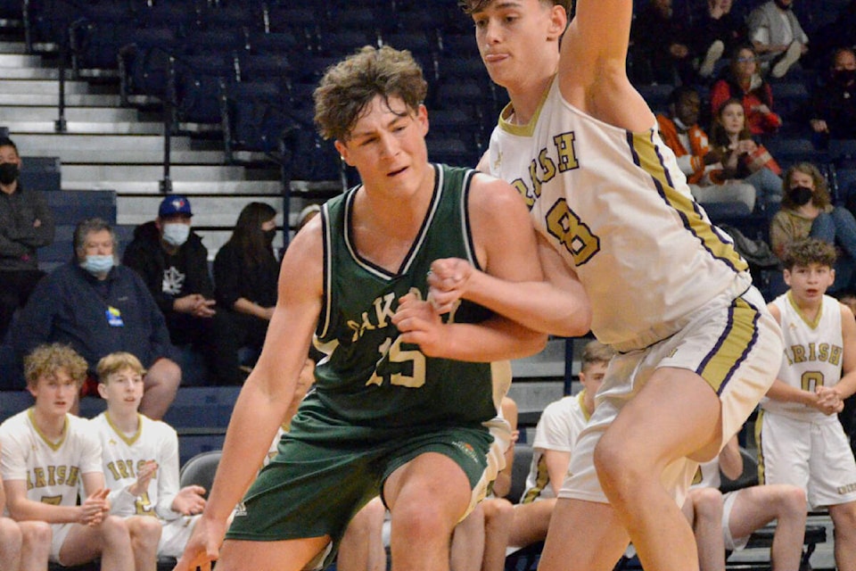 Oak Bay’s Finn Lillis pushes through during the final game of provincials, a loss to Vancouver College, on Monday night. (Photos courtesy of Gary Ahuja Langley Events Centre)