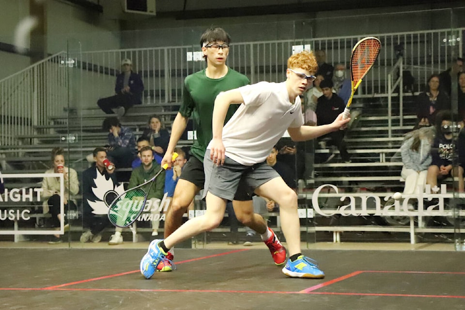 Greater Victoria player Rio Schaefer (in white) returns a volley during an under-19 boys match against Joseph Toth in the Canadian Junior Squash Championships, at the Cedar Hill Recreation Centre. Schaefer wound up tied for ninth while Toth placed sixth. The tournament ran Thursday through Sunday. See story on page A29. (Don Descoteau/News Staff)