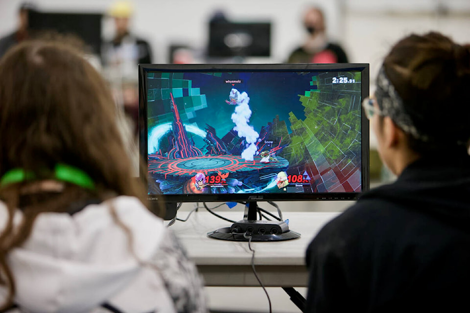 Two players compete against each other. Approximately 100 gamers from across B.C. gathered at the Archie Browning Sports Centre in Esquimalt Saturday to compete in the May Mayhem Smash Tourney and Expo video game competition. (Justin Samanski-Langille/News Staff)