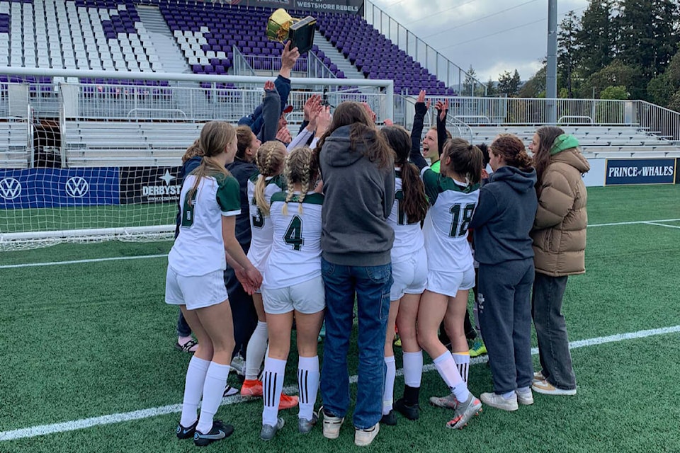 The Oak Bay High senior girls soccer team celebrates the city title. The team won the Ryan Cup May 12 with a 4-0 victory over Claremont secondary. (Courtesy Richard Fast)