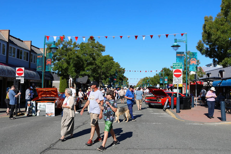 Crowds perused the displays along Beacon Avenue during the Torque Masters Sidney Summer Car Show on Aug. 7. (Bailey Moreton/News Staff)