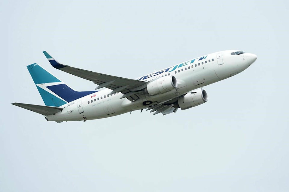 31404399_web1_221223-PNR-FlightCancellations-WestJetFlight_1