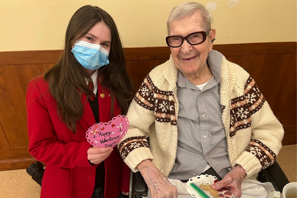 Albert Middleton, who turns 108 next month, stops for a photo with Grade 9 student Lois Delaney Harnett-Shaw. (Courtesy Lois Delaney Harnett-Shaw)