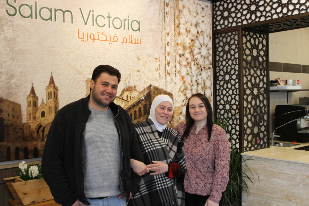 Safaa Naeman inside her Esquimalt restaurant, Syriana, with brother Mohamad Naman and sister-in-law Nour Rashead on April 20. (Austin Westphal/News Staff)