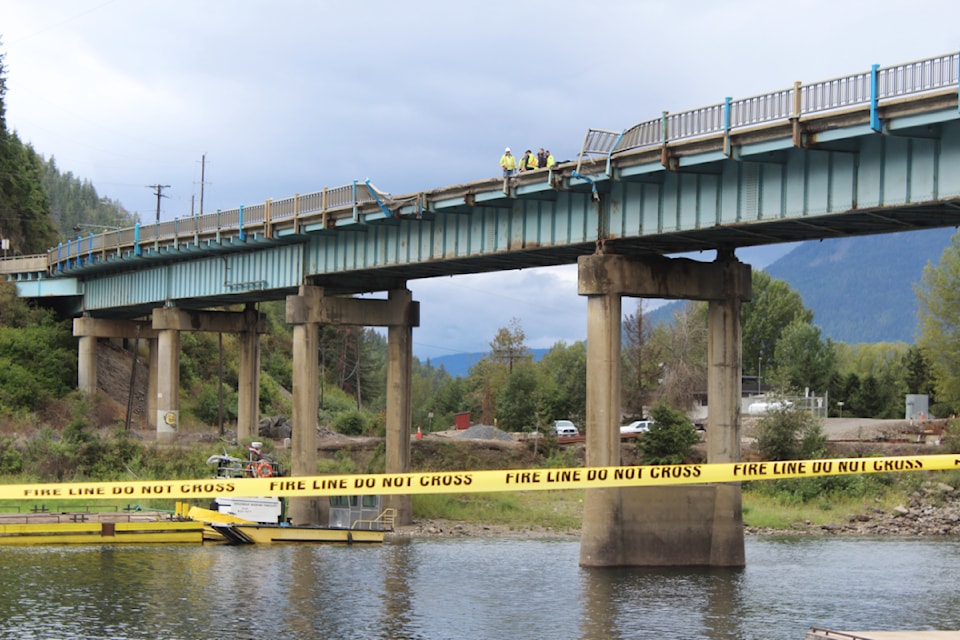 A single vehicle accident closed Highway 1 indefinitely at the Bruhn Bridge in Sicamous after a semi truck plunged into the channel on Saturday, Aug. 24.