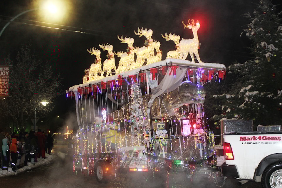 Santa added new recruit to his crew, with a T-Rex joining the herd at the annual Christmas Light Up Parade in Sicamous on Saturday, Dec. 7.