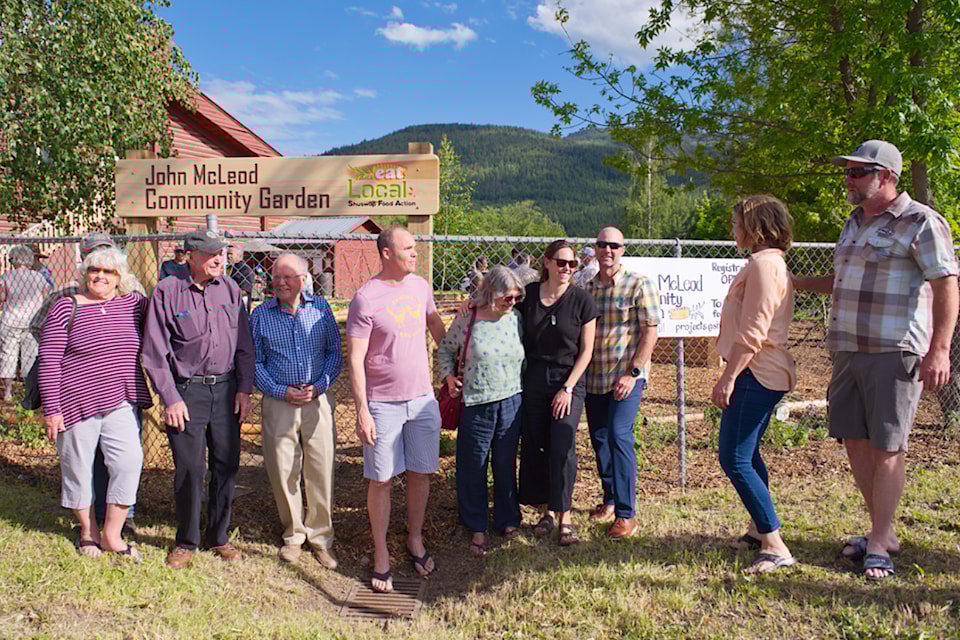 Members of the McLeod family take part in a group shot shared in front of the newly unveiled sign for the John McLeod Community Garden at the Salmon Arm fairgrounds on Thursday, June 6, 2024. 