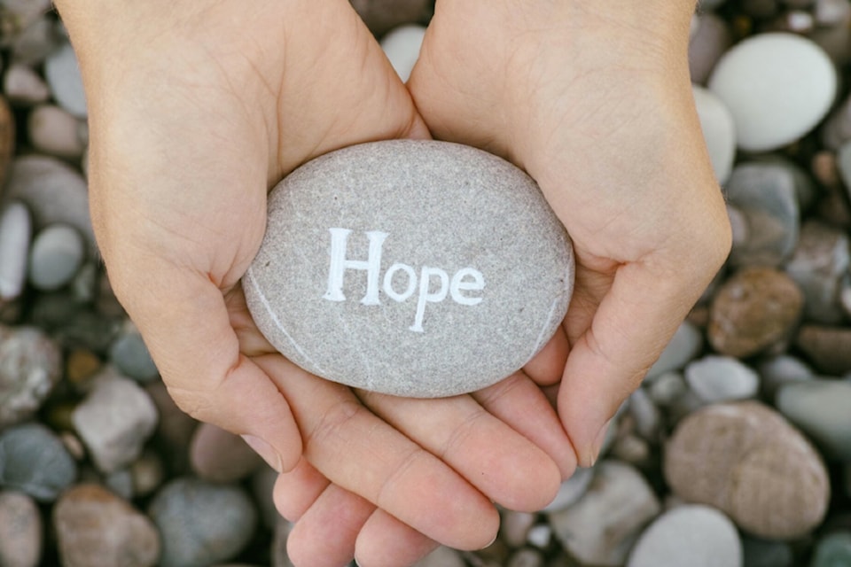 241114-saa-holding-hope