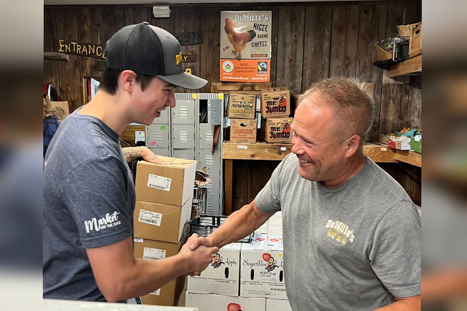 Brad DeMille, right, will be closing the farm market on Monday, May 5 to celebrate the life of Jonathon Bruce who died in a hiking accident on Easter Monday.