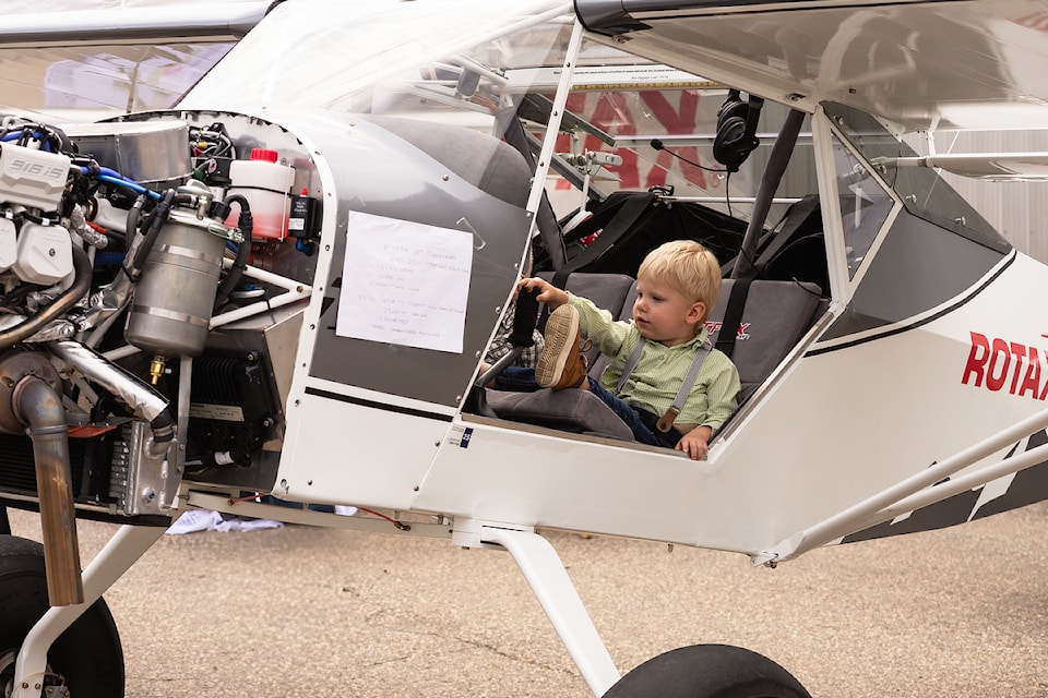 Strider Beagle explores the cockpit of a Kit Fox Series 7 Super Sport during the  Shuswap Emergency Expo at Shuswap Regional Airport on Sunday, June 24, 2025. 