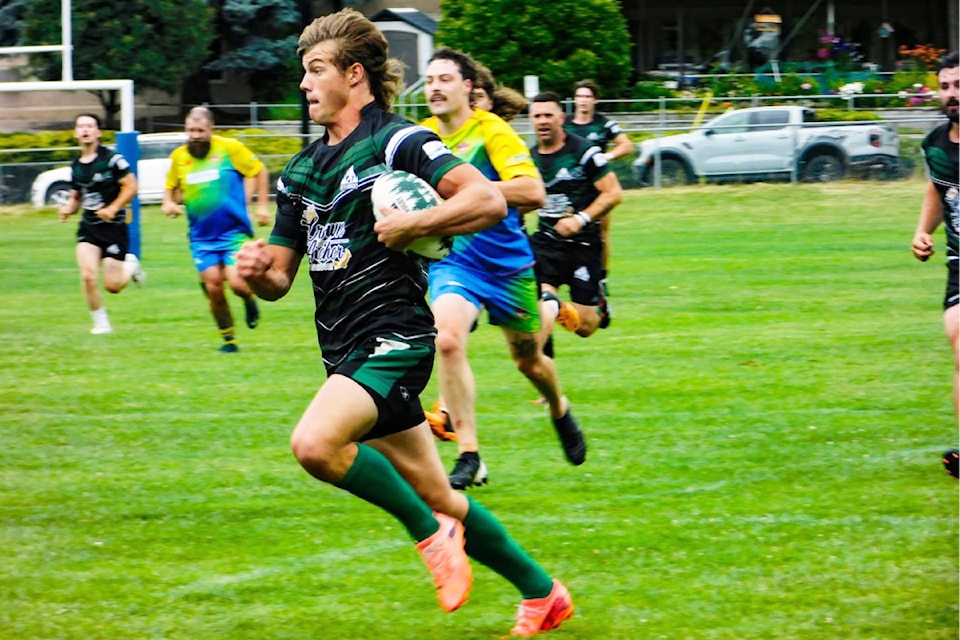 Salmon Arm Yeti player Jute Norlin advances the ball in rugby action versus the Vernon Jackals at J.L. Jackson Secondary on Saturday, June 21, 2025. 