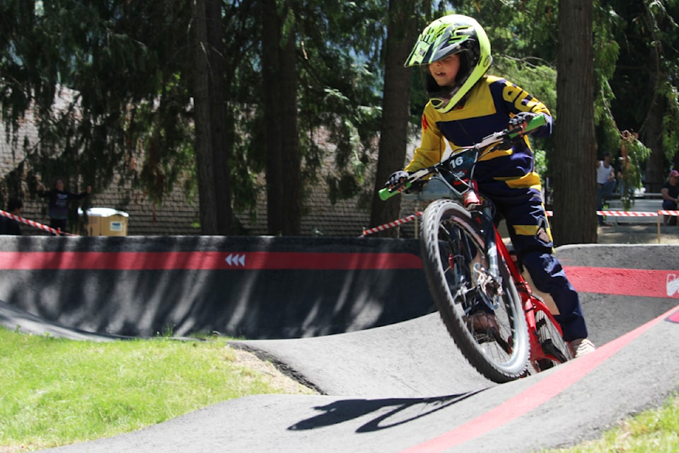 Local biker Maria Kaufman crests a  hill on her last lap at the 2025 Velosolutions Pump Track Qualifier in Sicamous Saturday, June 7.
