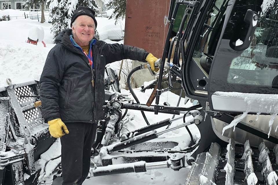 Larch Hills Nordic Society ski trail groomer Craig McBride fills up the club's new fuel efficient groomer. 