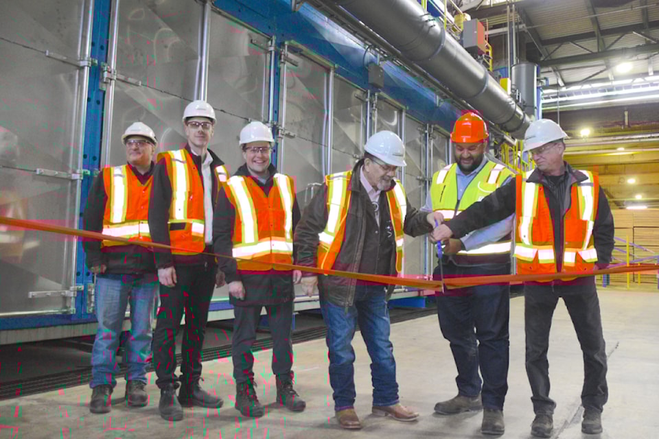 Minister of Forests Ravi Parmar attended the ribbon cutting of Canoe Forest Products' new drying kiln, a $14 million project the province helped fund. From left is Canoe general manager Marcello Angelozzi, plant manager Andy Anderson, BJ Mayer with FortisBC, Neskonlith Kukpi7 Irvin Wai, Minister of Forests Ravi Parmar and Canoe maintenance manager Gord Palmer. 