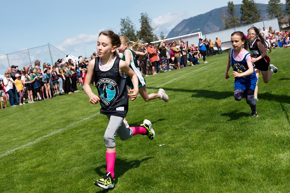Ranchero student Willow Grigg races around the first bend in her cross-country run during the Little Mountain Stomp in Salmon Arm on Wednesday, April 30, 2025.
